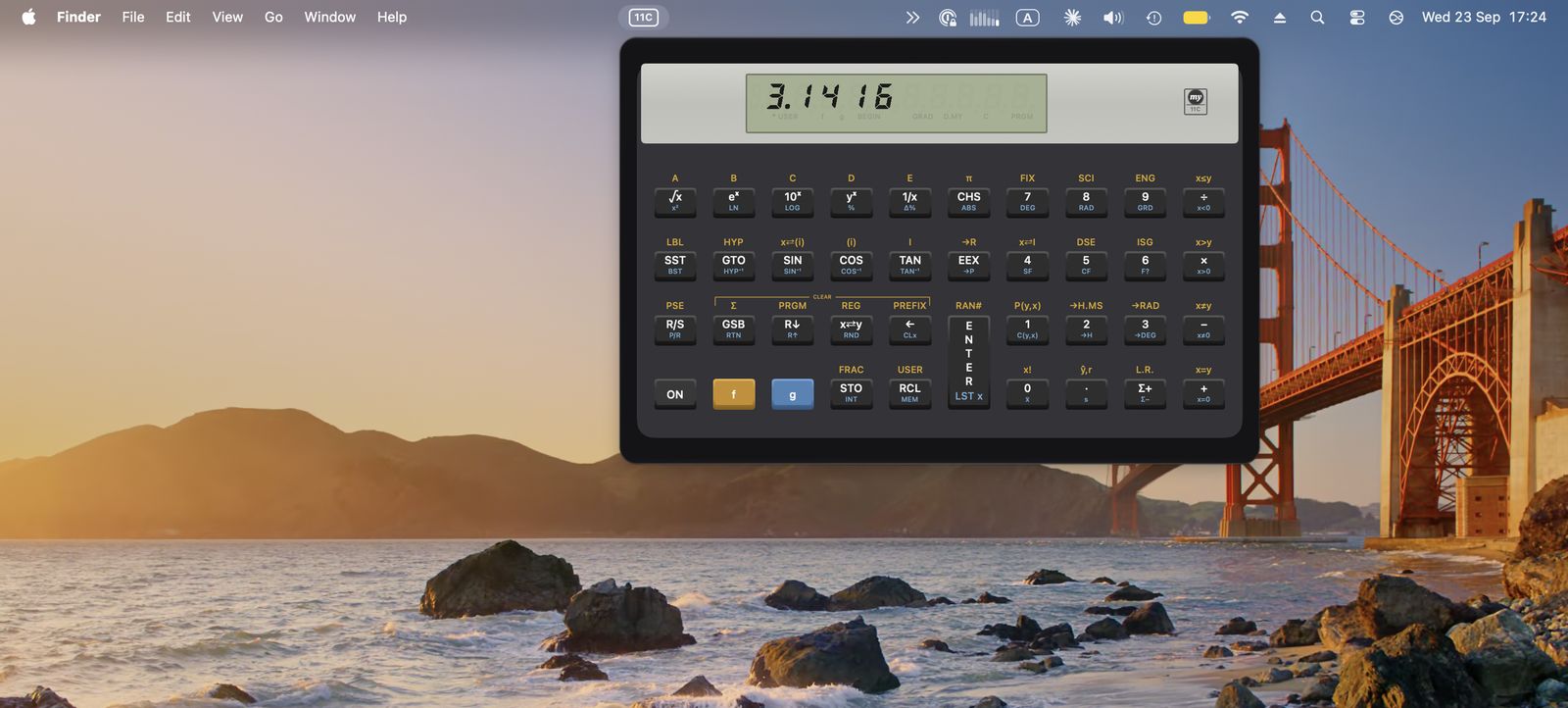 MY11C HP-11C emulator dropped down from the macOS menu bar over the desktop, showing 3.1416 on the LCD